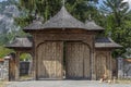 The wooden gate of the Polovragi Monastery, Gorj, Romania.