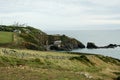 Polpeor Cove Lifeboat Station and Lizard Lighthouse, The Lizard, Cornwall, England, UK