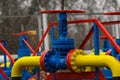 Poltava, Ukraine - February 3, 2023: Pipes, taps and a valve for shutting off gas supply at a gas compressor station