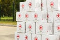 Boxes with humanitarian aid with the logo of the humanitarian organization \