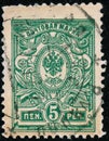 Vintage stamp printed in Finland 1911 show coat of arms of tsarist Russia