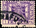 Vintage stamp printed in Spain 1940 shows coat of arms and the word telegrafos