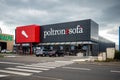 Poltron E Sofa storefront on a busy road in Le Mans, France