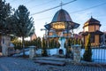 Old rustic wooden orthodox christian church and the statue of the Virgin Mary Royalty Free Stock Photo