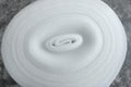 Polyethylene foam roll on gray background, above view Royalty Free Stock Photo