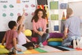 Polyglot children answering question Royalty Free Stock Photo