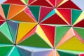 polygonal surface with colored triangles, tessellation of a three-dimensional floor with colored polygons. decoration with