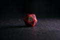 A polyhedral twenty sided die used for role playing games such a