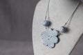 Polymer clay necklace pendant blue flower