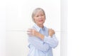 Polymyalgia senior woman painful upper arms Royalty Free Stock Photo