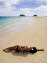 Polynesian girl in a black bikini