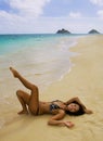 Polynesian girl in a black bikini Royalty Free Stock Photo