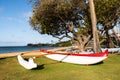 Polynesian outrigger canoe on the beach Royalty Free Stock Photo