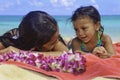 Polynesian sisters at the beach Royalty Free Stock Photo