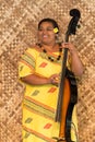 Polynesian woman playing sting instrument