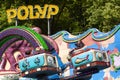 Polyp amusement ride at funfair park in daytime.