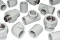 Polypropylene fittings for plumbing pipeline on the white surface Royalty Free Stock Photo