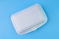 Polystyrene storage box isolated on a blue background Royalty Free Stock Photo