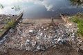 Polystyrene, styrofoam garbage on the shore Royalty Free Stock Photo