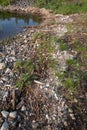 Polystyrene, styrofoam garbage on the shore Royalty Free Stock Photo