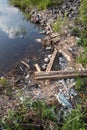 Polystyrene, styrofoam garbage on the shore Royalty Free Stock Photo