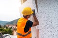 Polystyrene thermal cladding for energy saving on a construction site Royalty Free Stock Photo