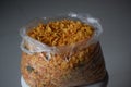 Polythene bag filled with spicy corn flakes Royalty Free Stock Photo