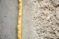 Polyurethane foam filled crack in the wall Royalty Free Stock Photo