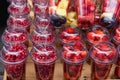 Pomegranate arils and strawberries on plastic containers Royalty Free Stock Photo