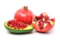 Pomegranate, avocado, pomegranate seeds on white background