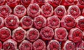 Pomegranate Closeup, Background. Group Of Ripe Pomegranates Fruits Neatly Laid Out On Counter In Store