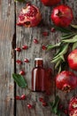 pomegranate essential oil in a bottle. selective focus.