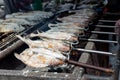 Pomegranate fish with salt and then burned for sales in the market. Thai style street food. Royalty Free Stock Photo