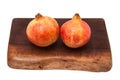 Pomegranate fruit , Punica granatum on a white studio b