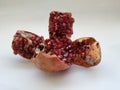 Pomegranate Fruit Sliced into Four Section  on white Background Royalty Free Stock Photo