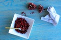 Pomegranate fruits inside a white bowl