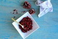 Pomegranate fruits inside a white bowl