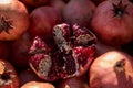 Pomegranate garnet fruit background pattern. Fresh raw organic garnet fruit pile texture background. Ruby natural