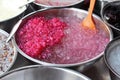 Pomegranate grains lie in an ice basin