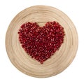 Pomegranate heart on white background