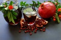 Pomegranate juice, fruit, seeds, branches. Royalty Free Stock Photo