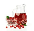 Pomegranate juice in a glass jug and fresh fruit Royalty Free Stock Photo