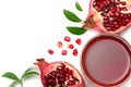 Pomegranate juice with pomegranate isolated on a white background top view