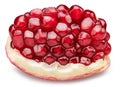 Pomegranate piece with pomegranate seeds isolated on a white background. Clipping path. Stacking focus, maximum detail Royalty Free Stock Photo