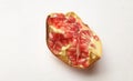 Pomegranate, (Punica granatum) with green leaf cut in half isolated on white backdrop.concept healthy fruit