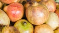 Pomegranate ripe unattractive on basket