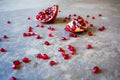 Pomegranate with scattered seeds Royalty Free Stock Photo