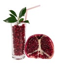 Pomegranate section and cocktail with a straw