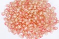 Pomegranate seed pile or Punica granatum on white background Royalty Free Stock Photo