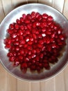 Pomegranate seeds in a bowl